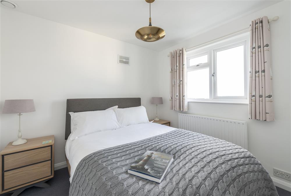 Double bedroom with 5’ bed and sea views (photo 3) at Landward Cottage (Devon), Start Point Lighthouse