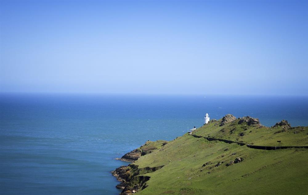 The lighthouse lies on a dramatic headland above Start Bay  at Landward Cottage (Devon), Start Point Lighthouse
