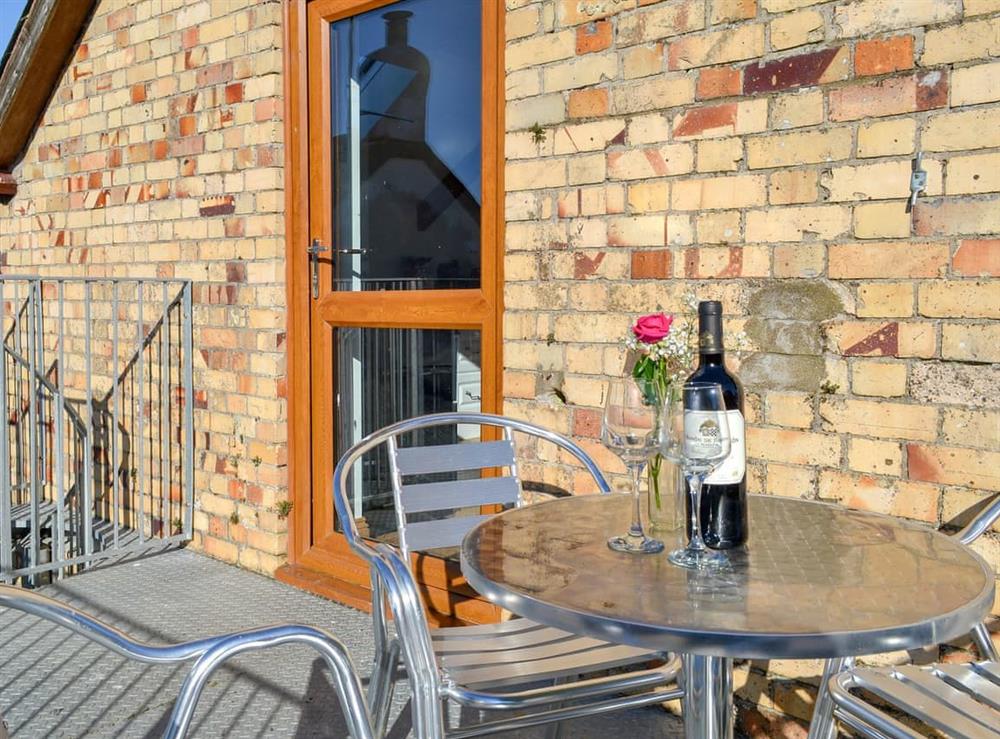 Balcony with outdoor furniture at Lane End Loft, 