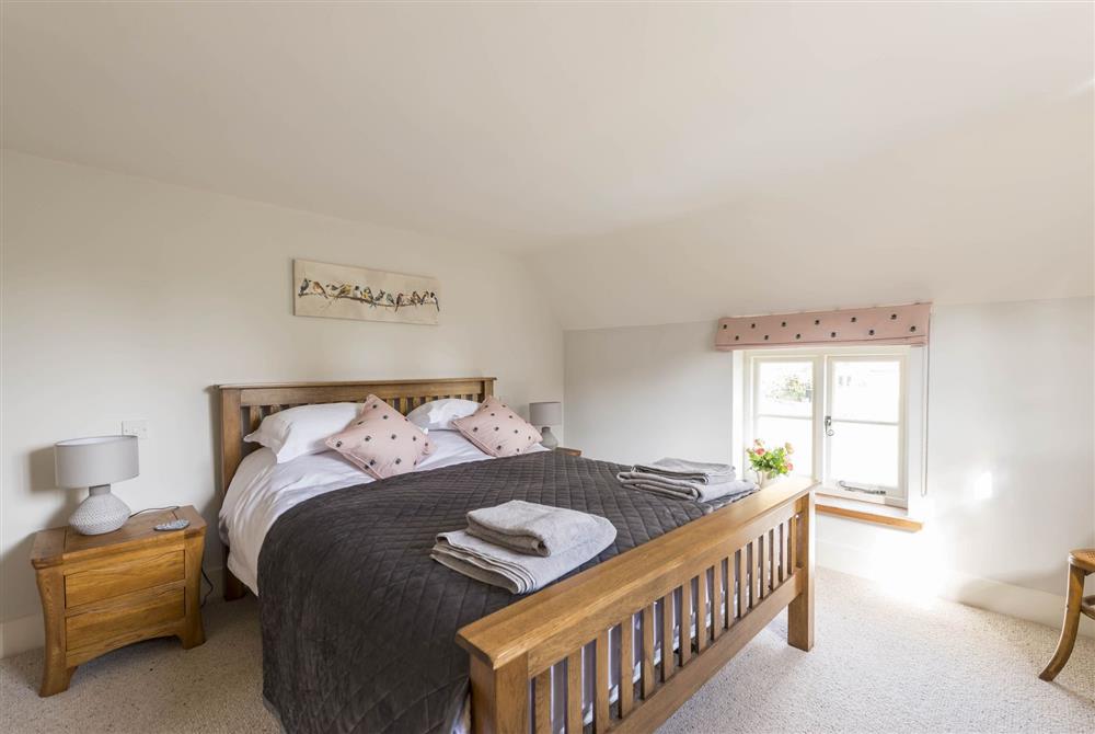 Master bedroom with en-suite at Lanes End Cottage, Dorchester