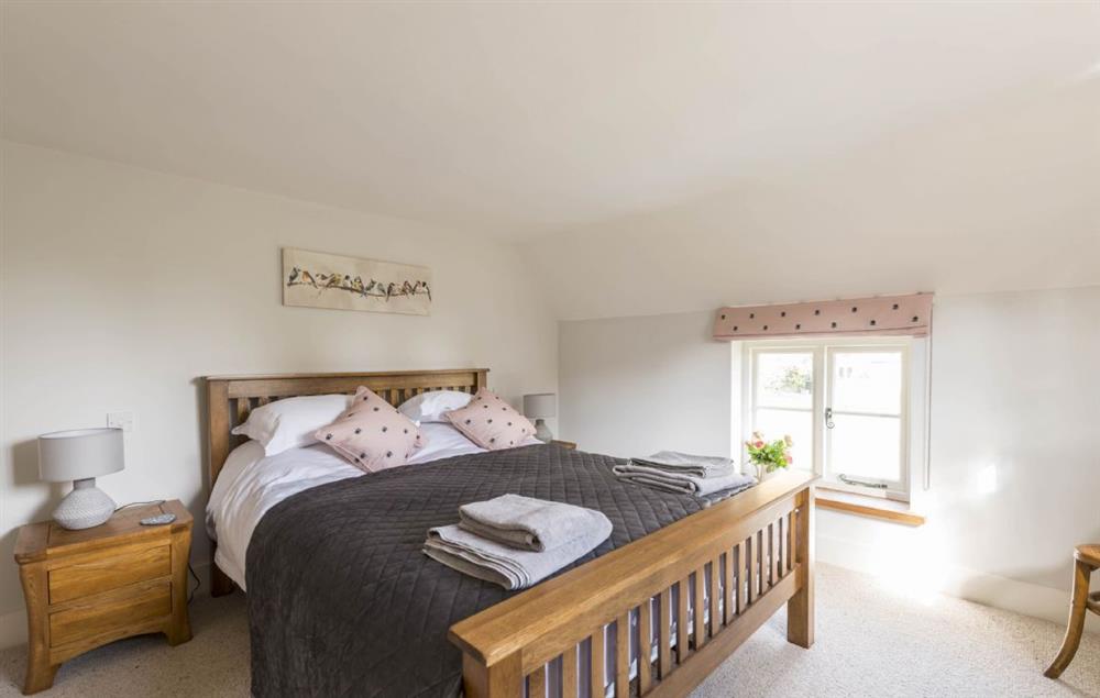 Master bedroom with king-size bed and en-suite bathroom (photo 2) at Lanes End, Lower Wraxall