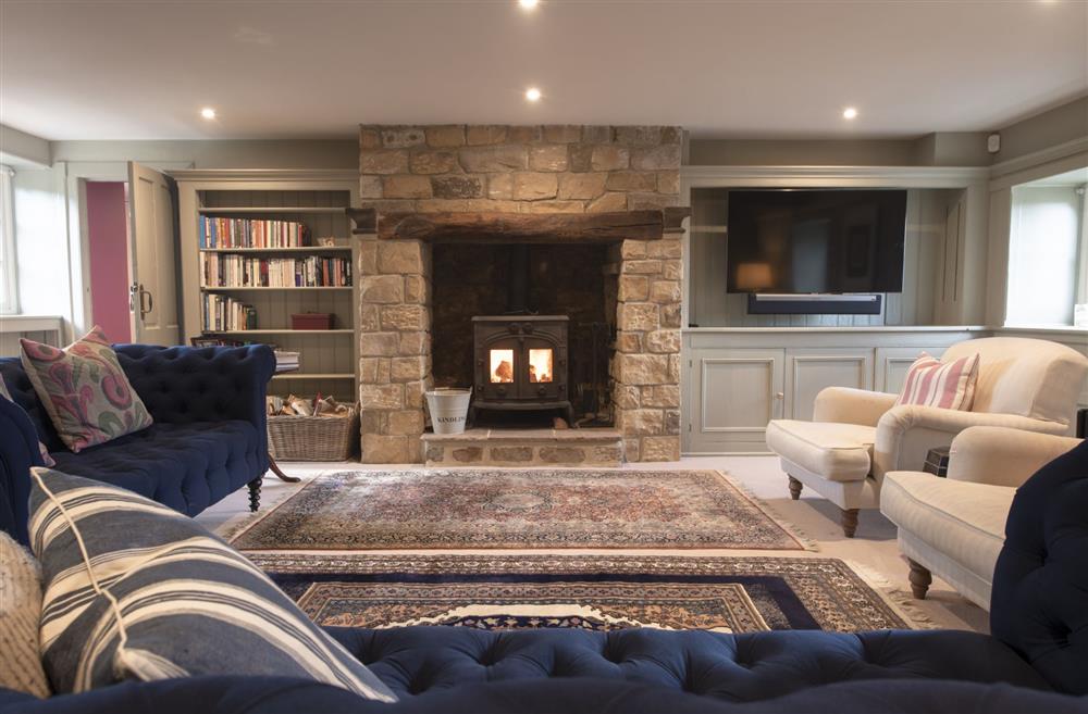 Lanesfoot Farm, Yorkshire: Cosy sitting room with wood burning stove at Lanesfoot Farm, Harrogate