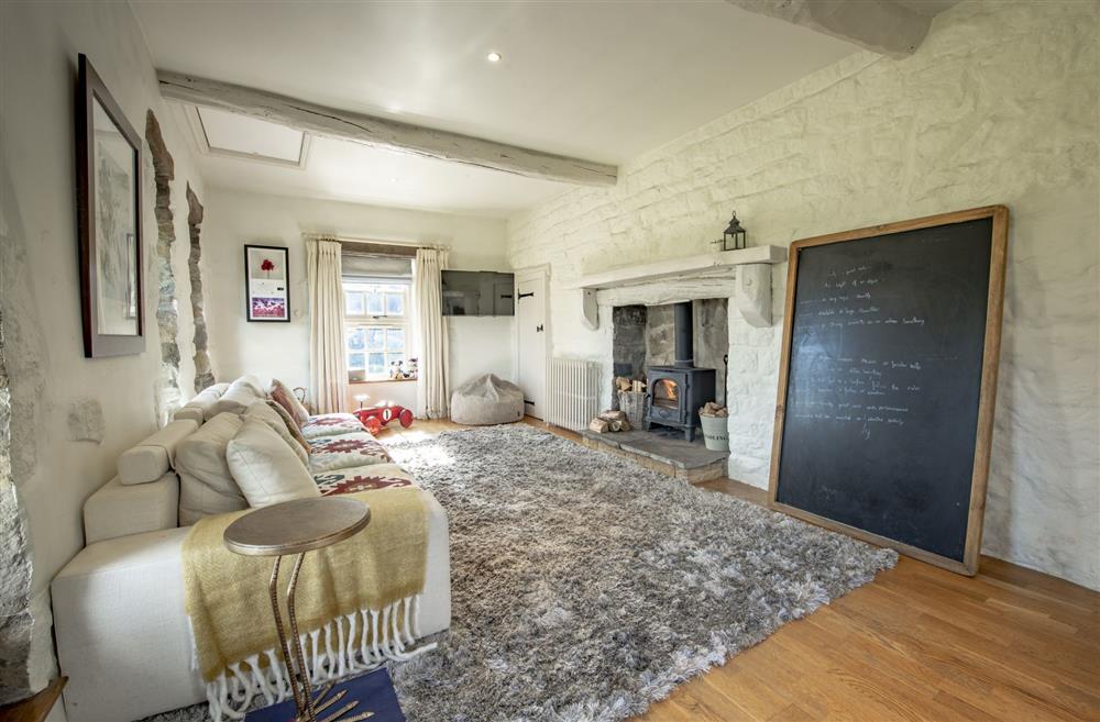 Lanesfoot Farm, Yorkshire: Playroom with wood burning stove, giant chalk board and fun activities for the little ones
