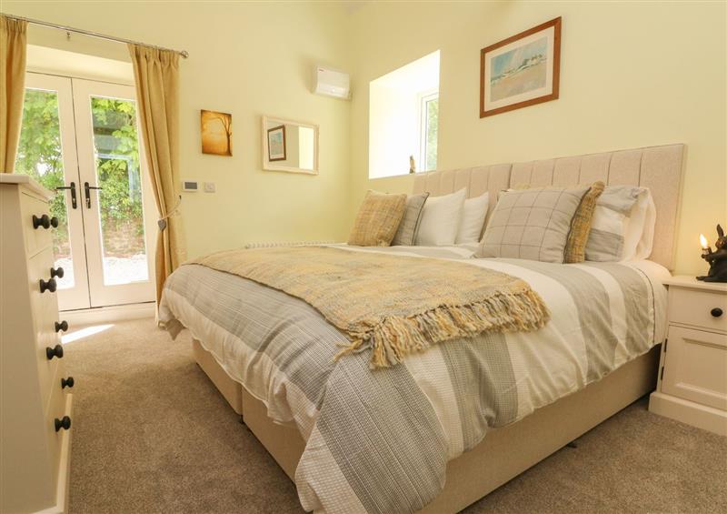 A bedroom in Langdale Barn at Langdale Barn, Sampford Courtenay