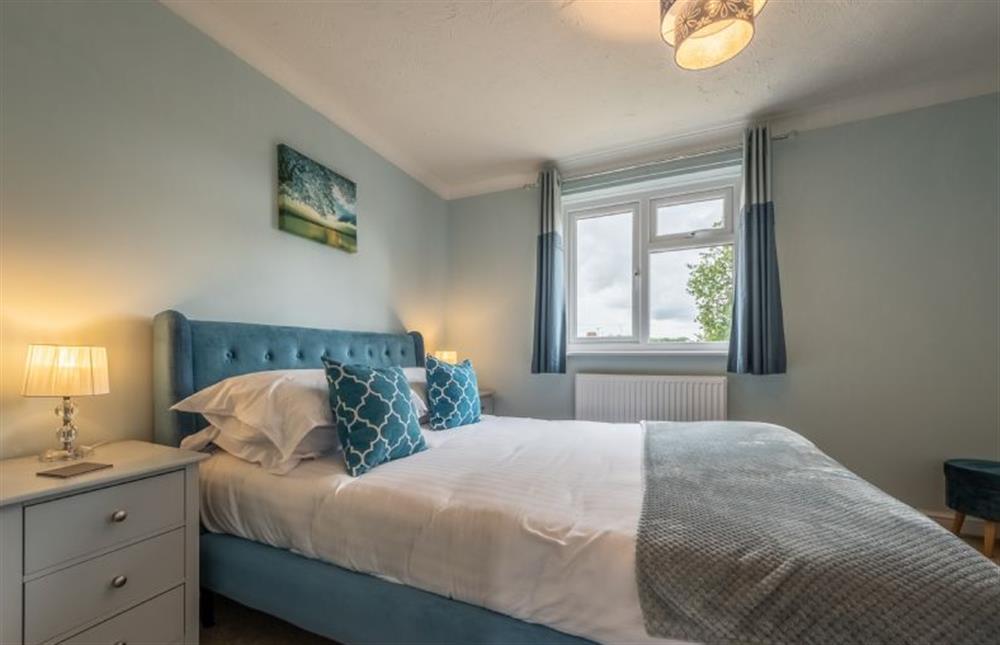 Bedroom three has a king-size bed at Langdale, Heacham near Kings Lynn