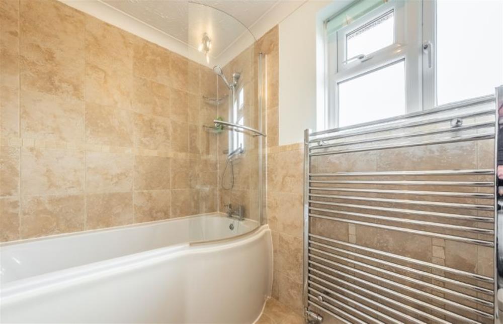 The family bathroom has a bath and shower over at Langdale, Heacham near Kings Lynn