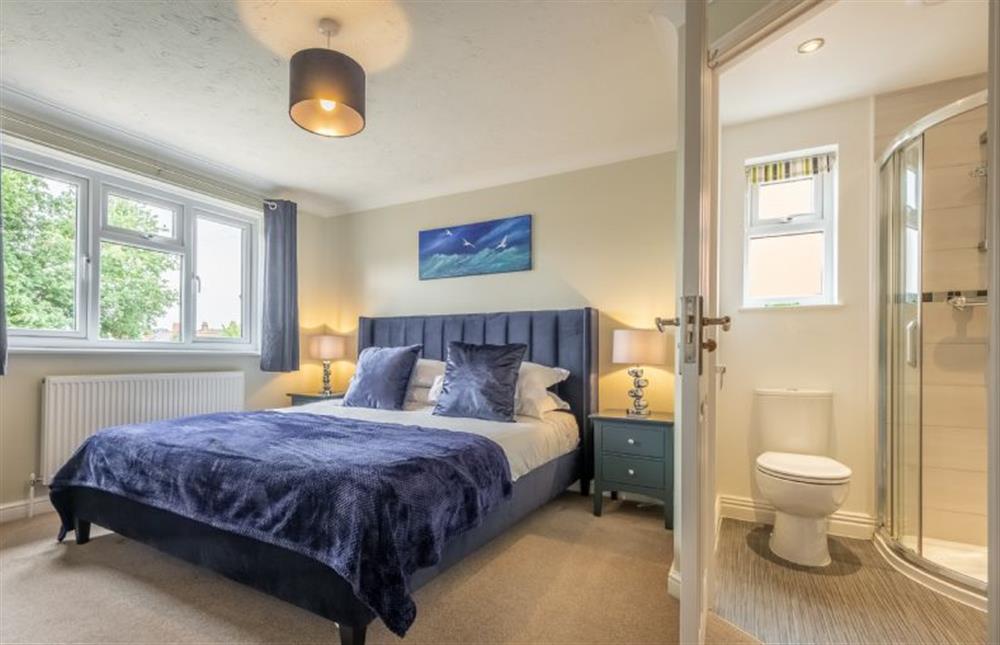 The master bedroom has an en-suite shower room at Langdale, Heacham near Kings Lynn