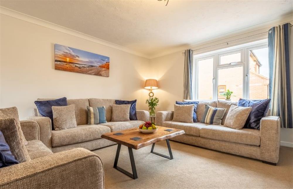 The stylish sitting room has plenty of comfy seating at Langdale, Heacham near Kings Lynn