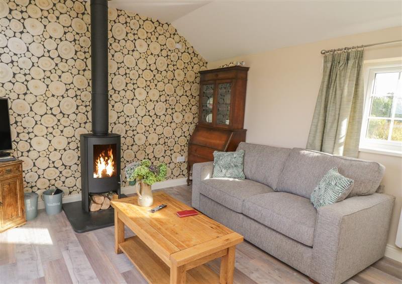 Relax in the living area at Langham Cottage, Liftondown near Lifton