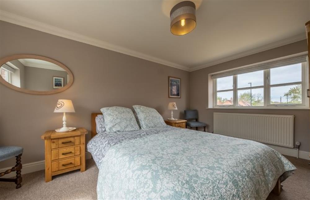 Lantern Cottage: A light and airy double aspect room with a double bed and windows to the front and rear of the property 
