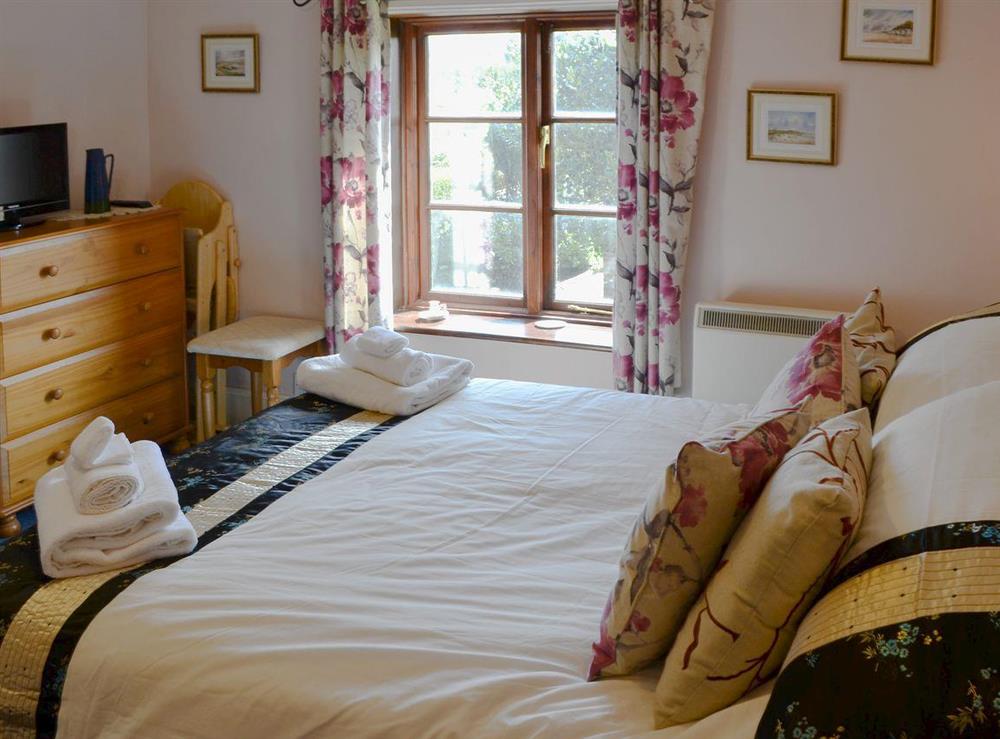 Comfy double bedroom at Lanthorn Cottage in Happisburgh, Norfolk