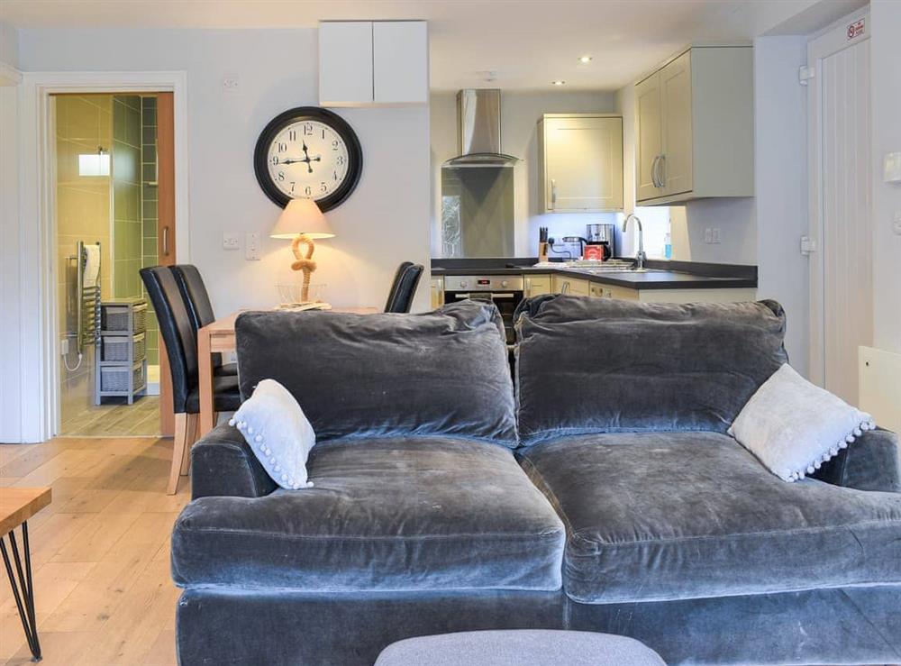 Open plan living space at Lapwing 1, The Cove in Brixham, Devon