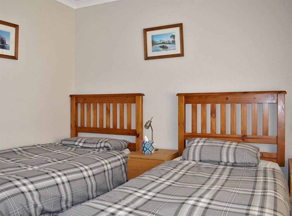 Peaceful twin bedroom at Lapwing Rise in Banavie, near Fort William, Highland