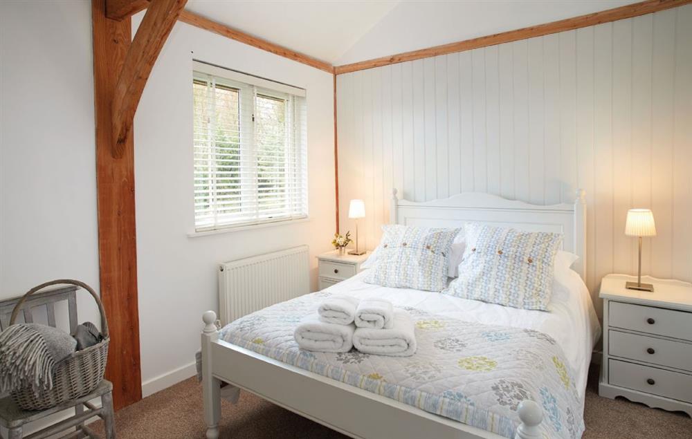 Double bedroom with 4’6 bed at Larch Barn, North Perrott
