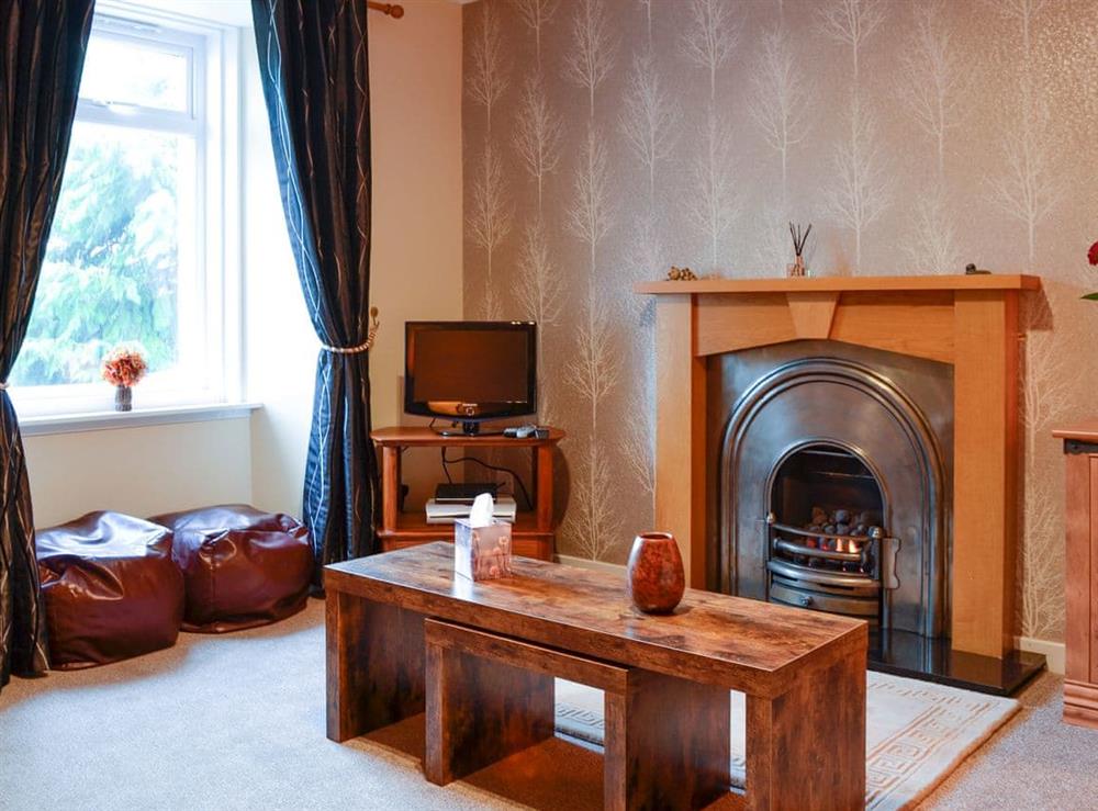 Cosy and inviting living room at Larch Cottage in Blairgowrie, Perthshire