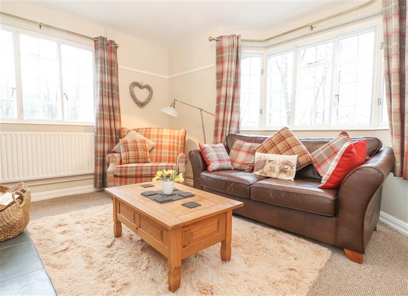 Relax in the living area at Larch Cottage, Hawkshead