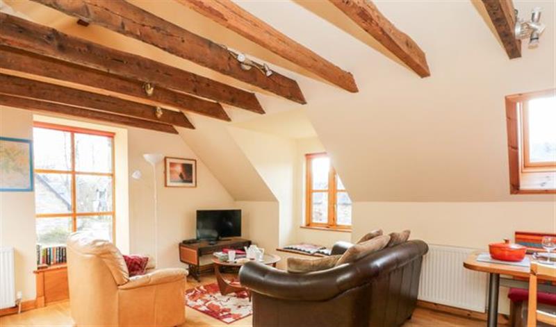 Relax in the living area at Larch Cottage, Aberfeldy