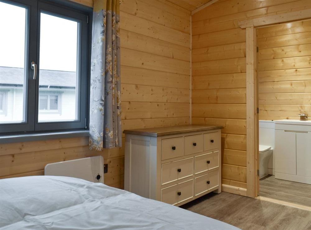 Peaceful double bedroom at Larch Lodge in Ulverston, Cumbria