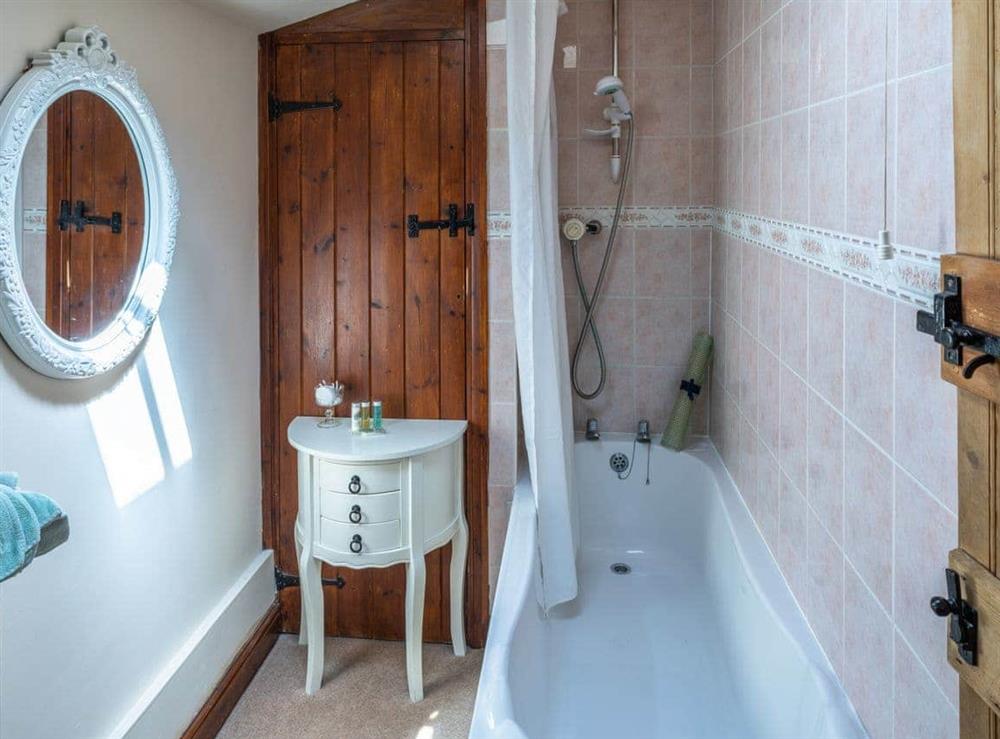 Bathroom with shower over bath at Bridge Cottage, 