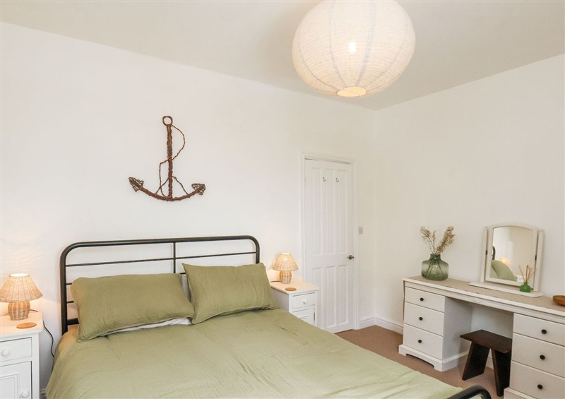 A bedroom in Launcher's Cottage at Launchers Cottage, Scarborough