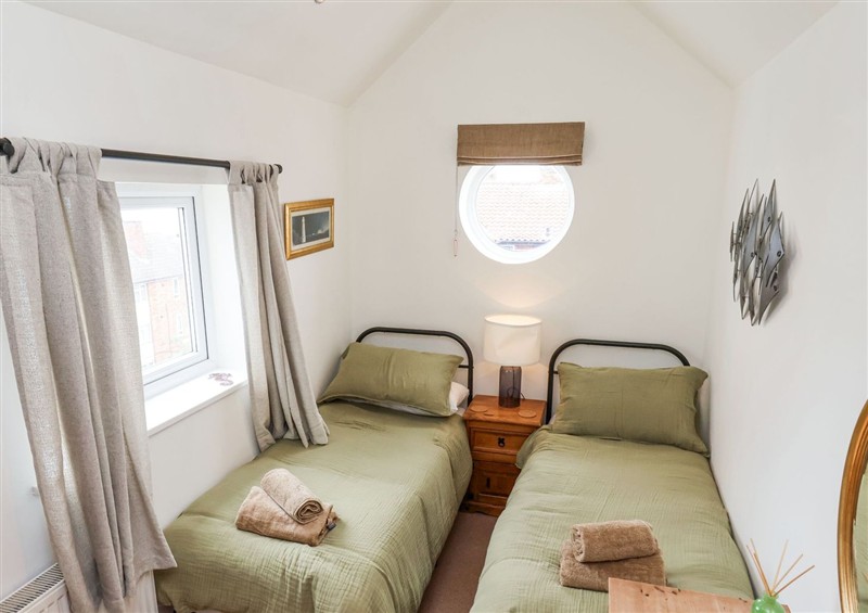 This is a bedroom (photo 3) at Launchers Cottage, Scarborough