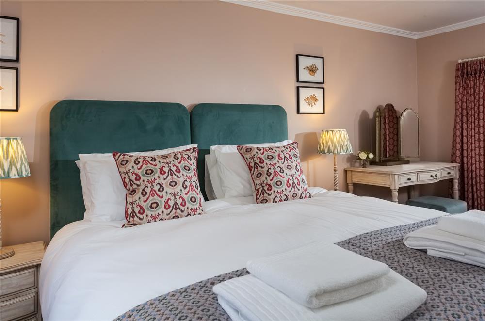 The bed can be configured to twin 3’ single beds at Laundry Cottage, Arley