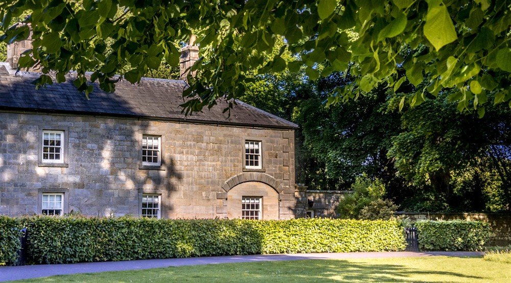 The front exterior of Laundry Cottage and the path that leads to the house (photo 3) at Laundry Cottage in Morpeth, Northumberland