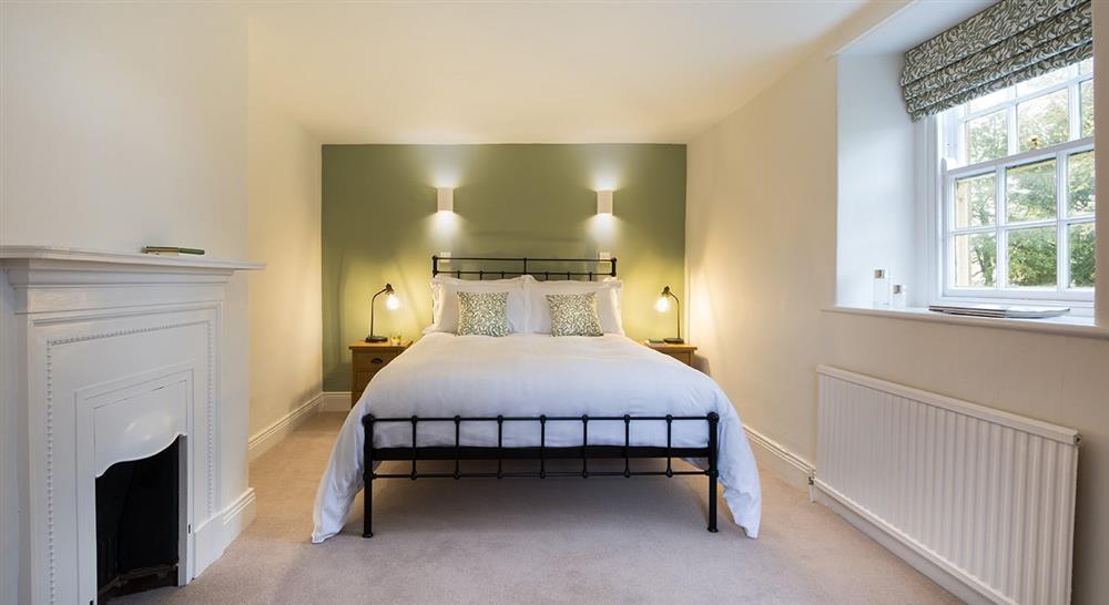The king size bedroom at Laundry Cottage in Morpeth, Northumberland