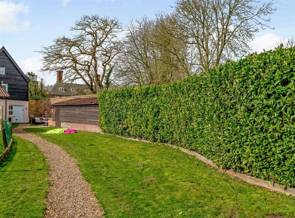 Spacious garden at Laurel Barn in Tacolneston, near Wymondham, Norfolk