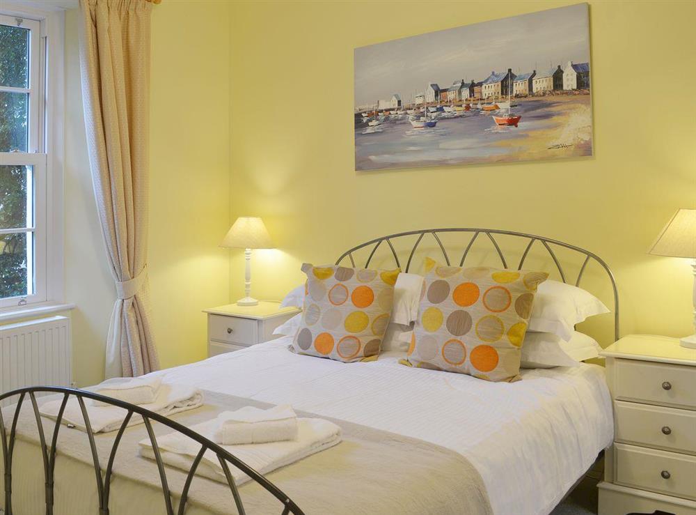 The cosy and romantic double bedroom at Laurel Cottage in Torquay, Devon