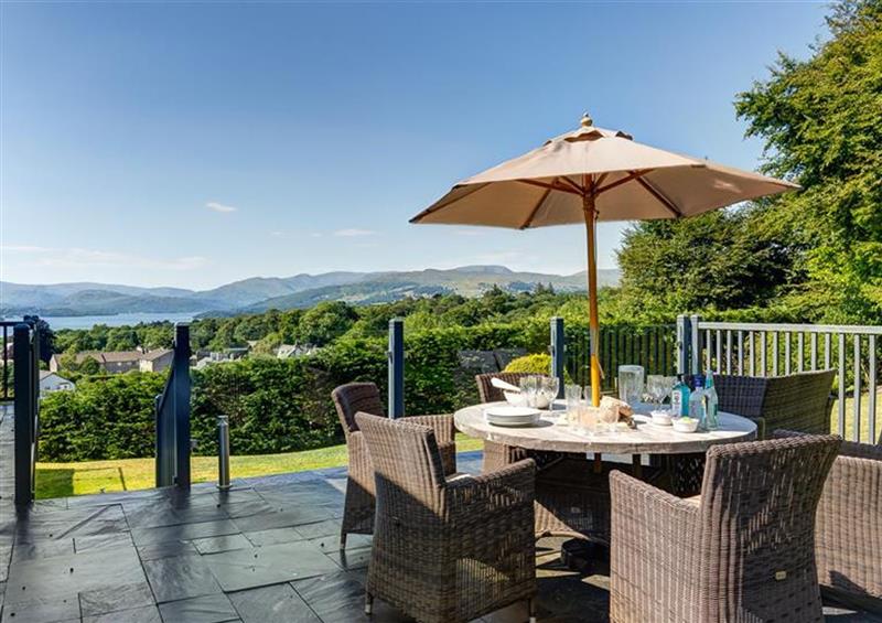Enjoy a glass of wine on the patio at Laurons View, Bowness On Windermere
