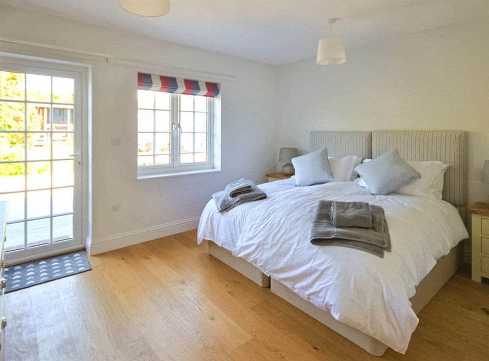 Large bedroom to the garden on the first floor at Lavausa in St Mawes, Cornwall