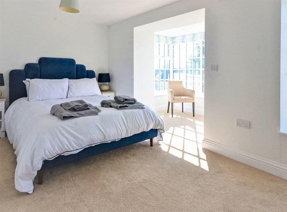 Master bedroom on the ground floor at Lavausa in St Mawes, Cornwall