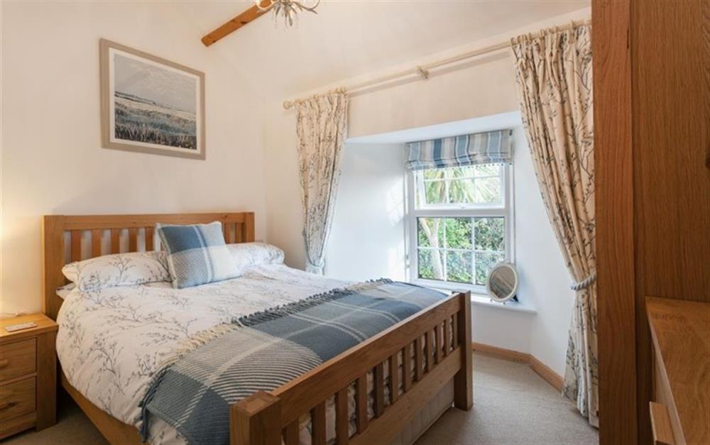 The master bedroom at Lavender Cottage in Bigbury