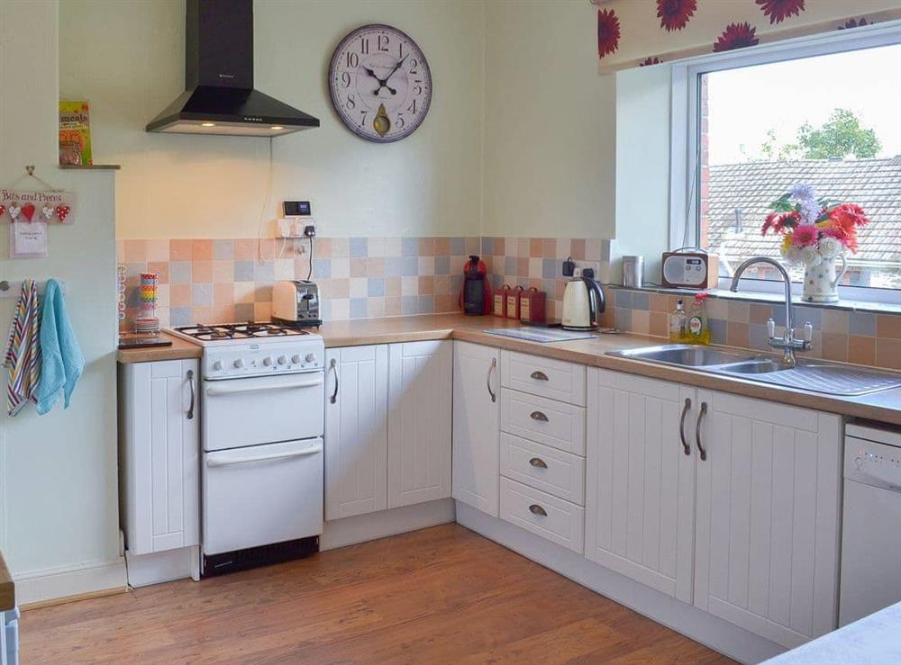 Well-fitted and well-equipped kitchen at Lavender Cottage in Buckfastleigh, Devon