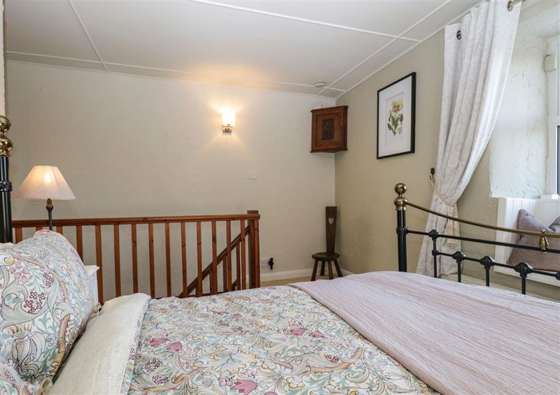 A bedroom in Lavender Cottage (photo 2) at Lavender Cottage, Cark In Cartmel