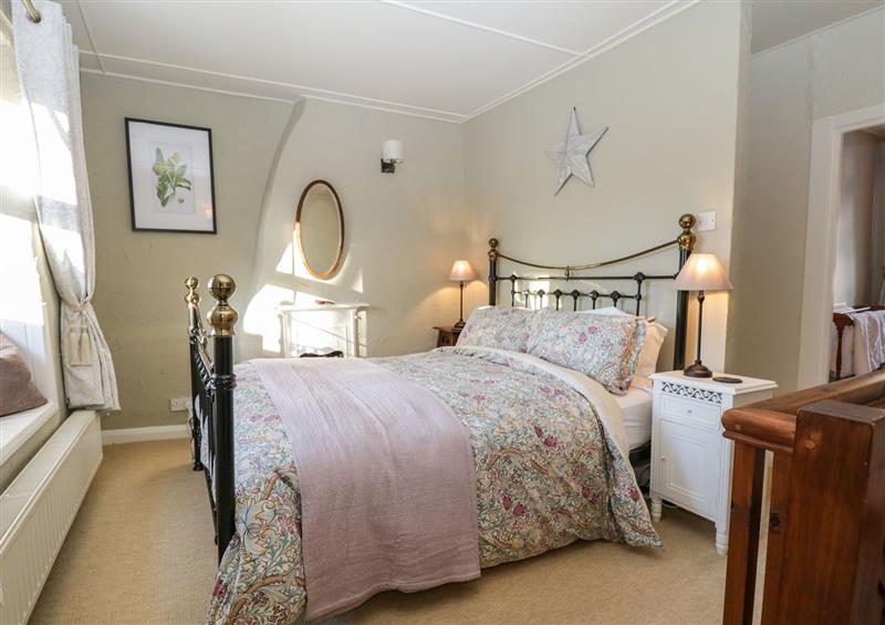 A bedroom in Lavender Cottage at Lavender Cottage, Cark In Cartmel