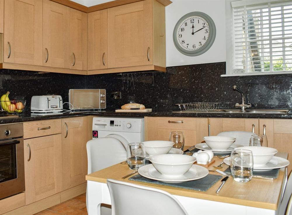 Well equipped kitchen/ dining room at Lavender Cottage in Leyburn, North Yorkshire