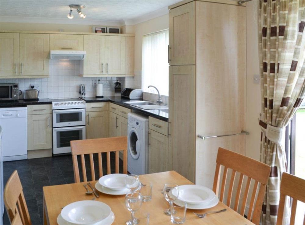 Kitchen & dining area at Lavender Cottage in Sea Palling, Norfolk