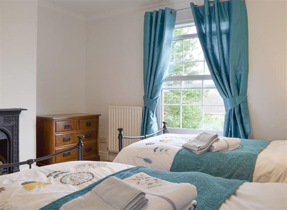 Comfortable twin bedroom at Lavender Cottage in Winterton-on-Sea, near Great Yarmouth, Norfolk