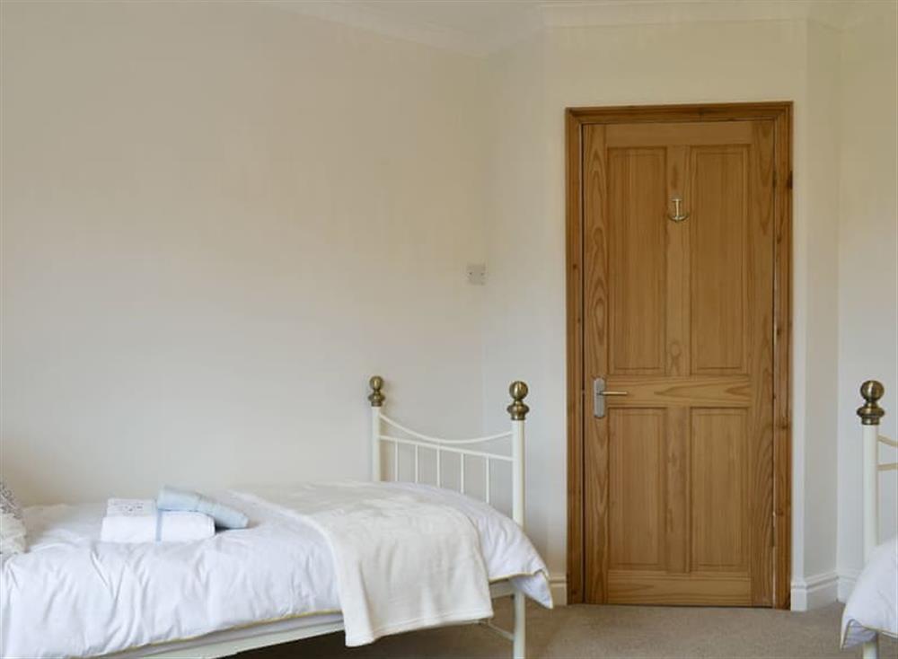 Good-sized twin bedroom at Lavender Cottage in Winterton-on-Sea, near Great Yarmouth, Norfolk