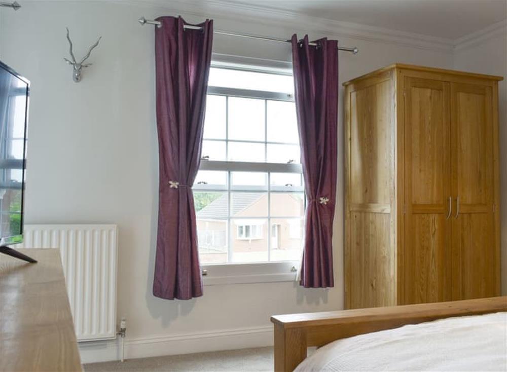 Stylish double bedroom at Lavender Cottage in Winterton-on-Sea, near Great Yarmouth, Norfolk