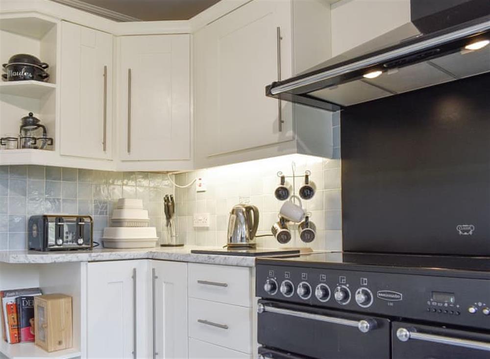 Well-equipped fitted kitchen at Lavender Cottage in Winterton-on-Sea, near Great Yarmouth, Norfolk