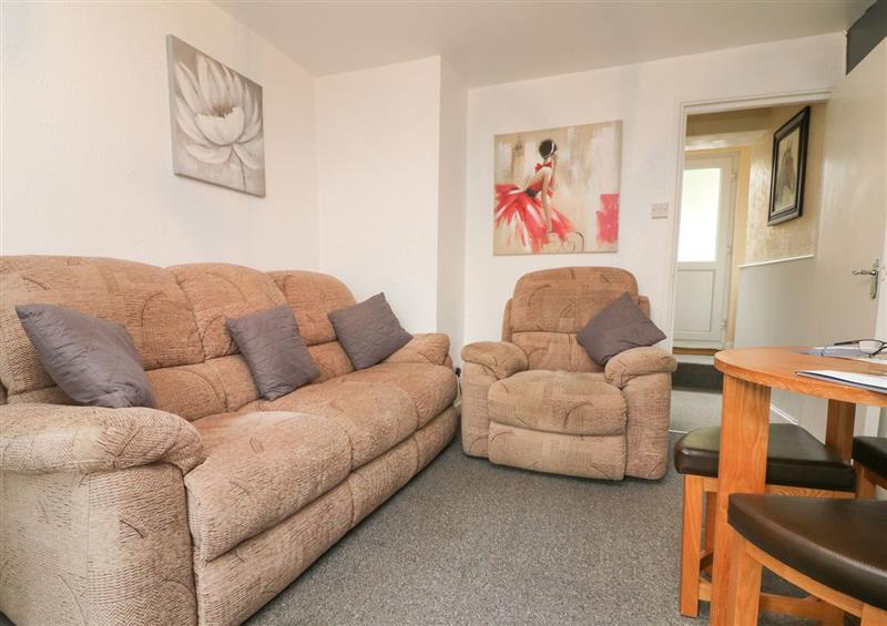 Relax in the living area at Lavercombe Farm Cottage, Combe Martin