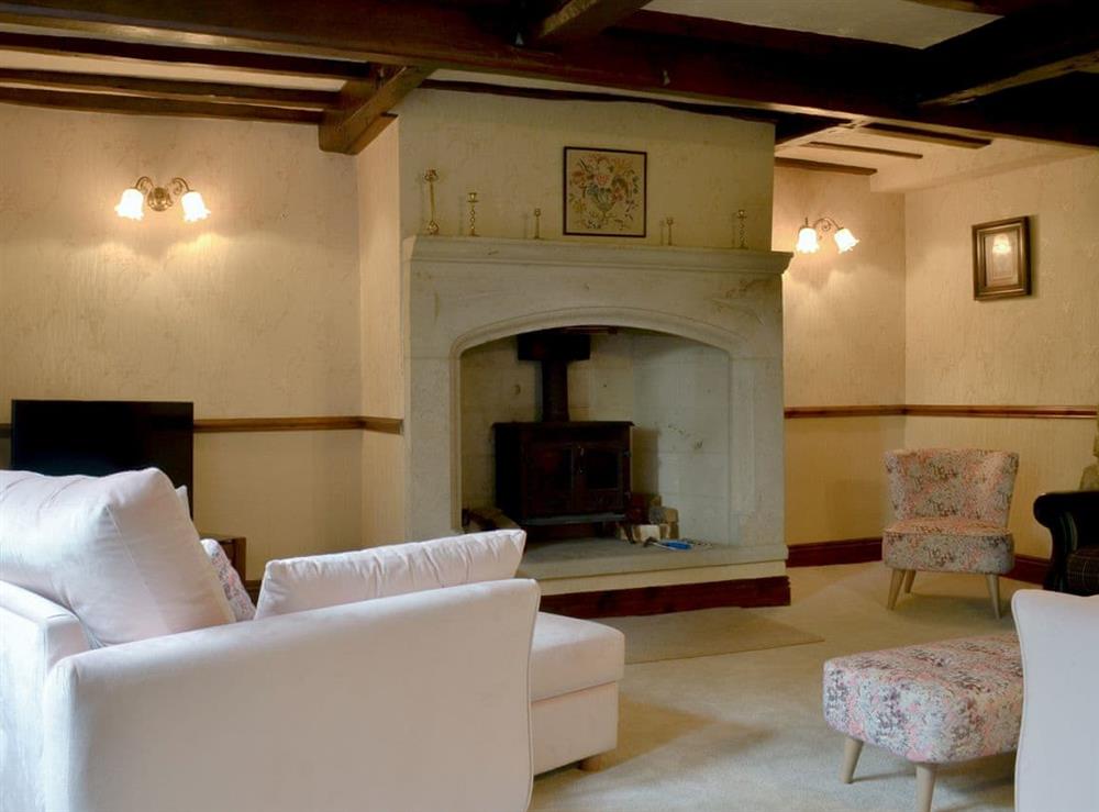 Characterful living room at Wisteria Cottage, 