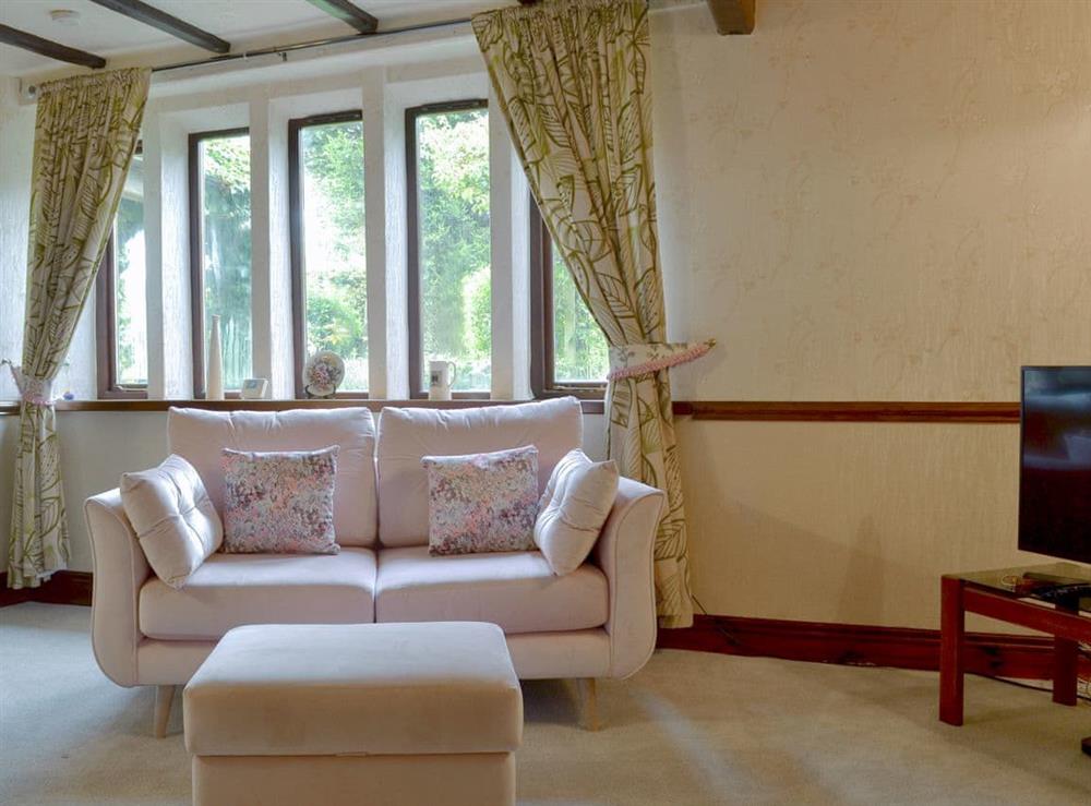 Spacious living room at Wisteria Cottage, 