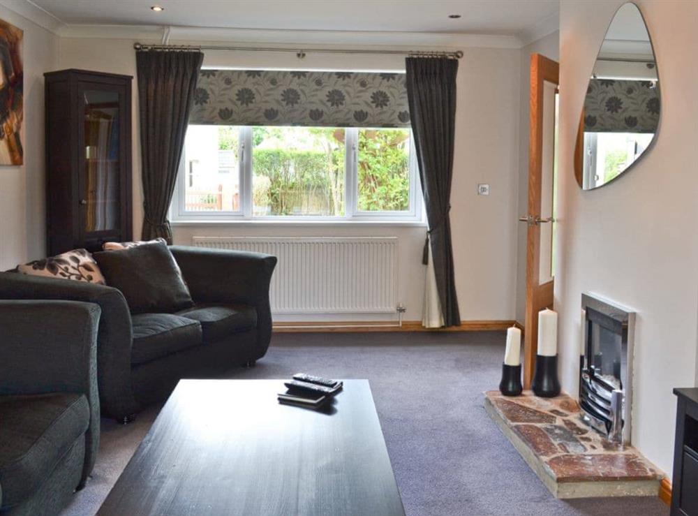 Living room at Lawn Lodge in Brockenhurst, near Lyndhurst, Hampshire