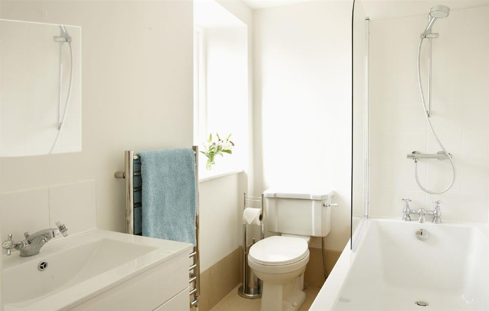 En-suite bath and shower over at Laylands, Wells-next-the-Sea
