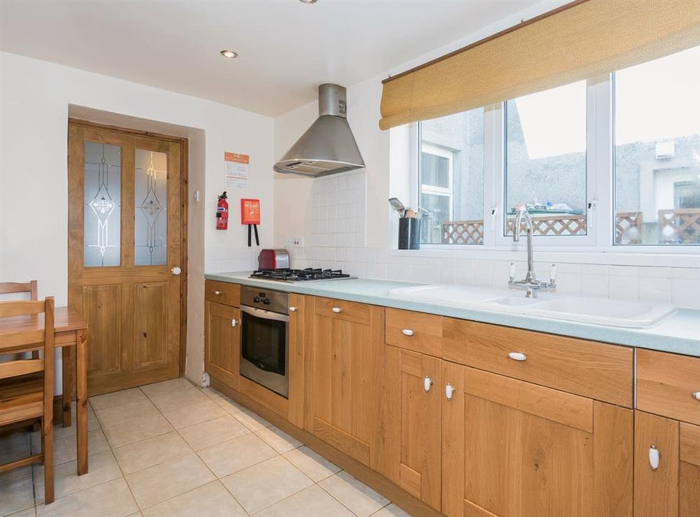 Bright and airy kitchen with modern appliances at Lazy Cottage in Haverigg, near Millom, Cumbria