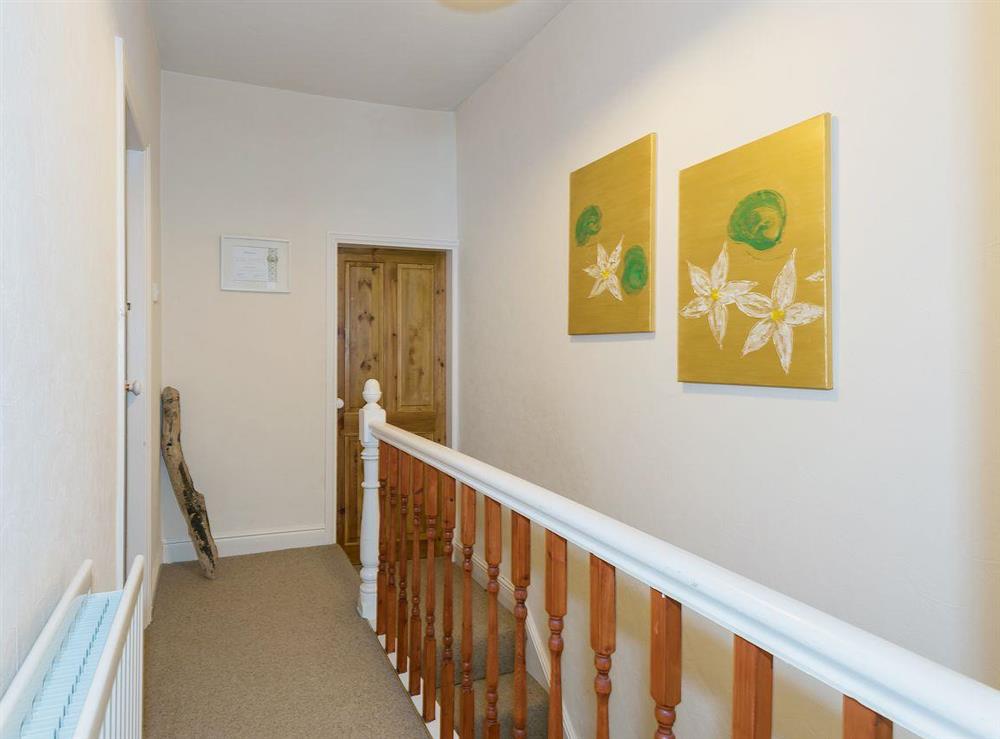 Bright landing area leading to bedrooms at Lazy Cottage in Haverigg, near Millom, Cumbria